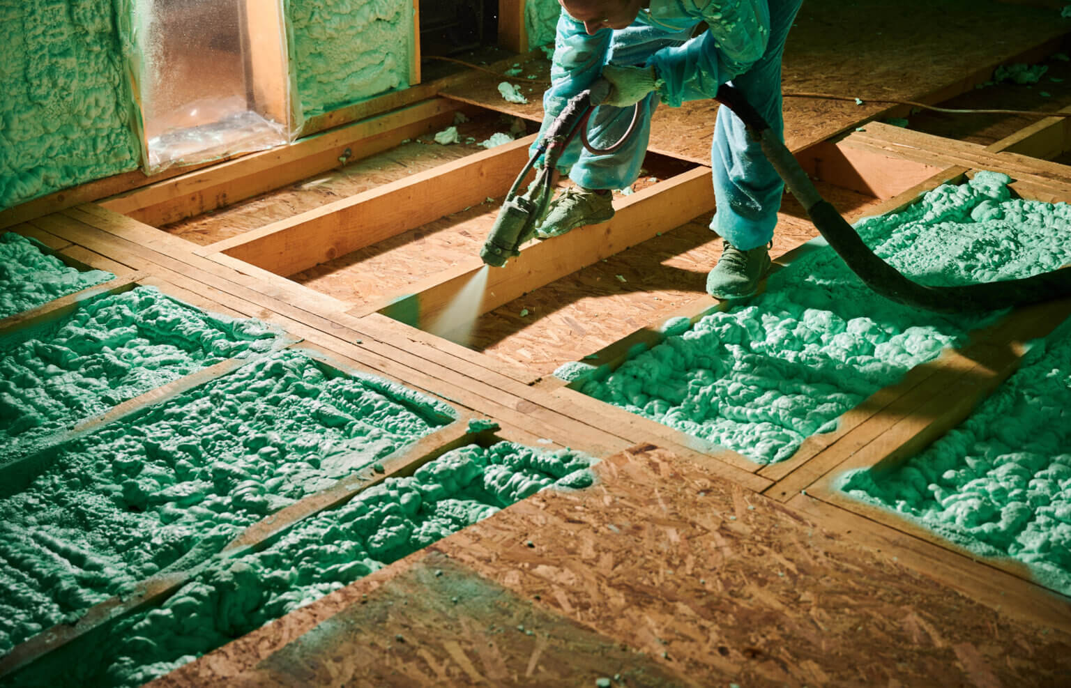 worker-spraying-polyurethane-foam-for-insulating-w-2023-11-27-05-18-42-utc-1